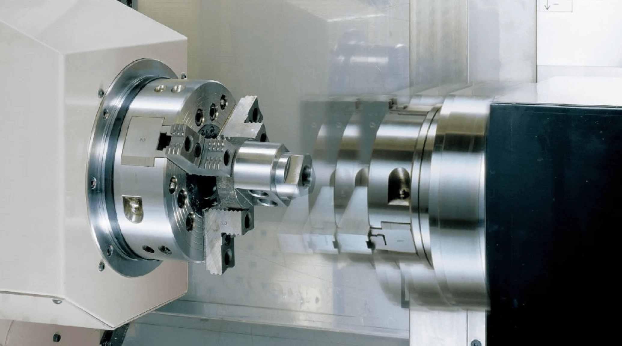 CNC turn-mill machine completing a complex shaft in one setup