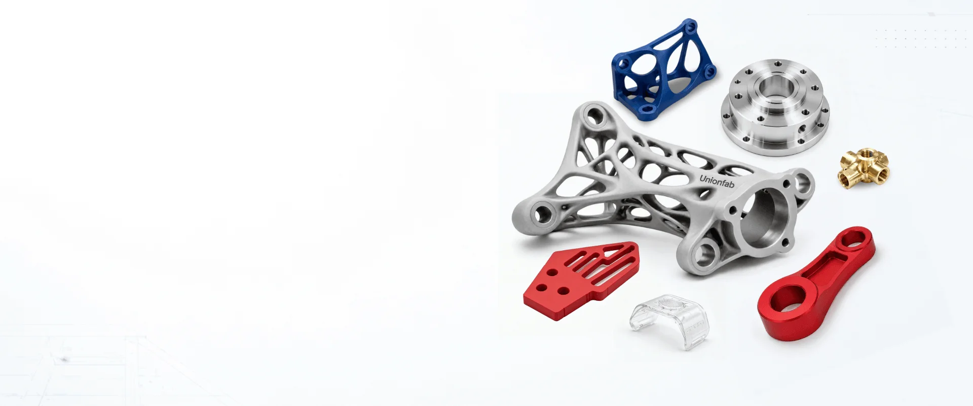 Various 3D printed and CNC machined metal, resin, and plastic parts for industrial manufacturing.