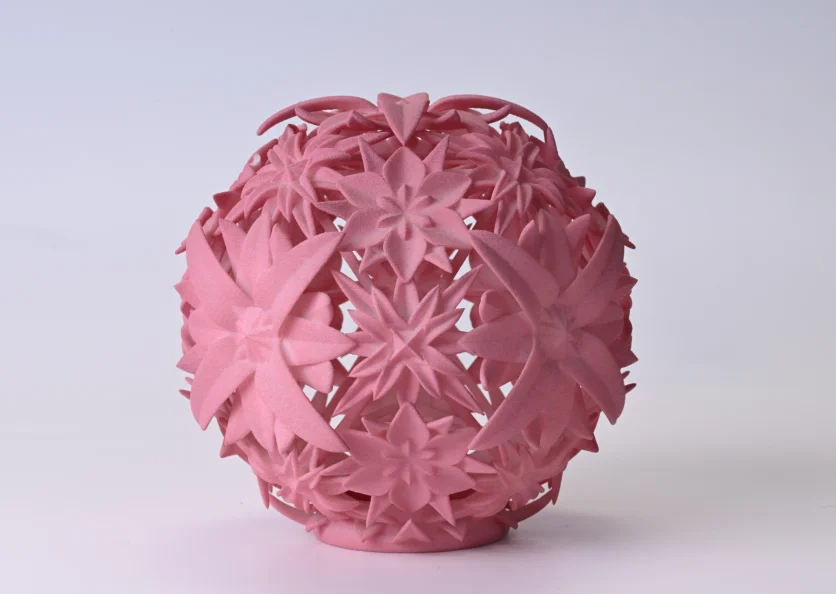 Pink SLS part with a finished surface